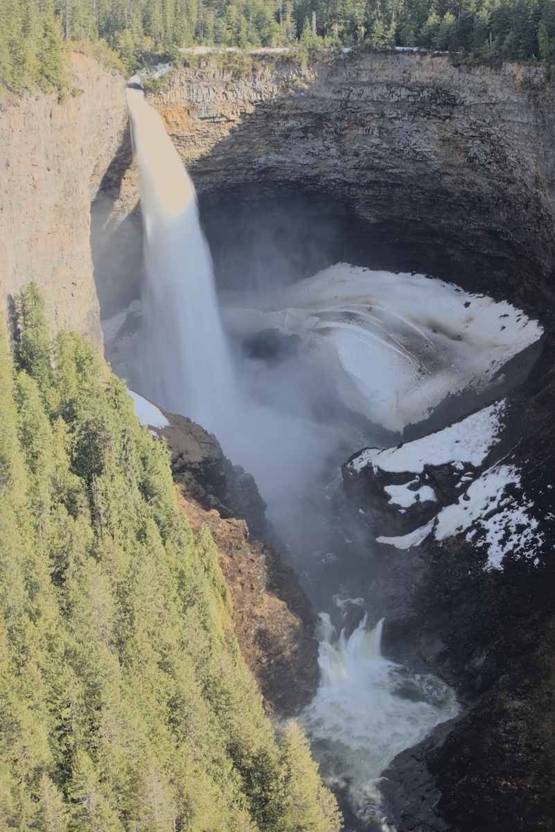 Helmcken falls with a secondary fall seen just downstream.  The large remnants of the ice cone may be seen stained by the runoff from the ledge above.