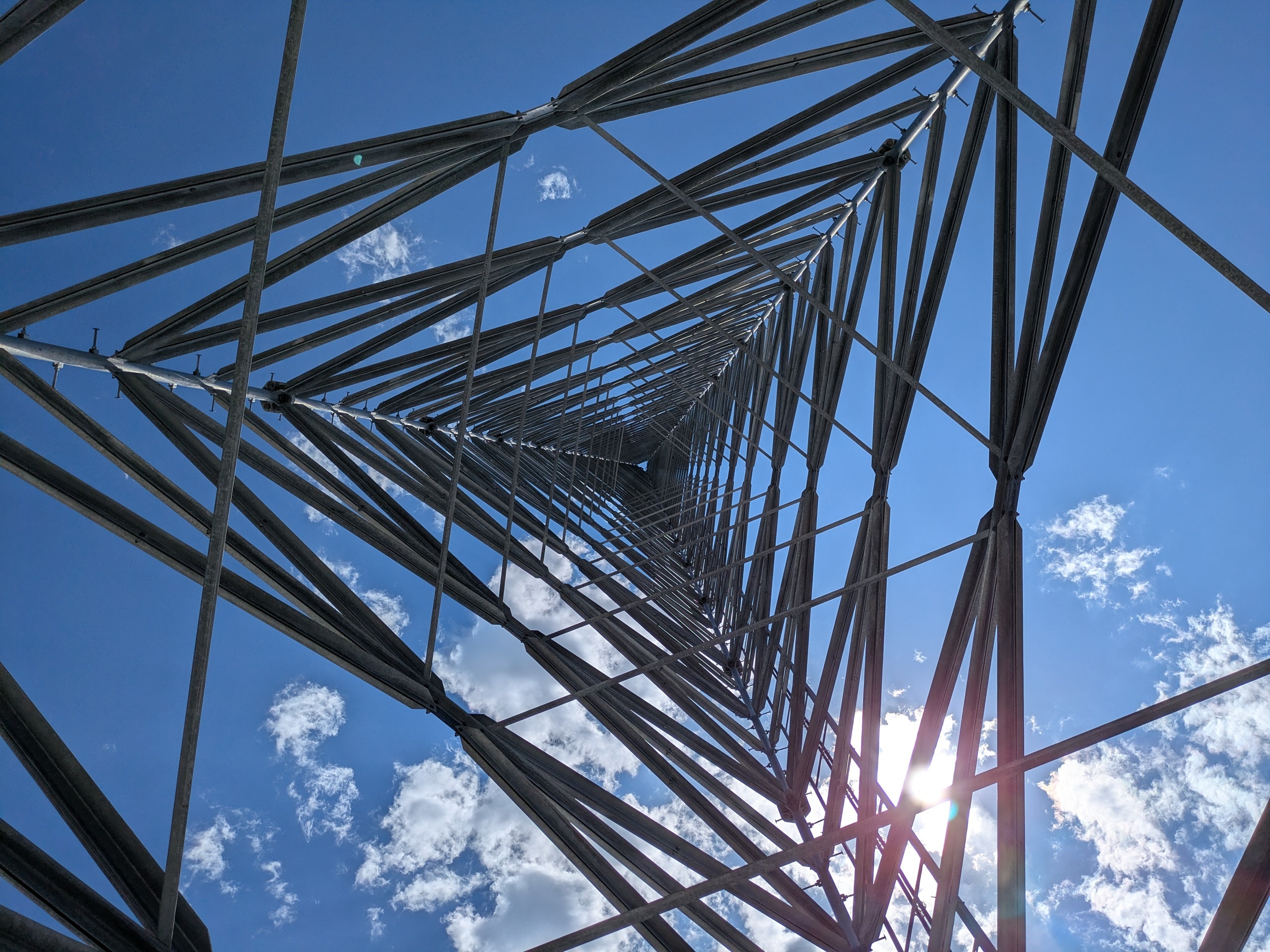 looking up from the bottom of a cellphone tower.